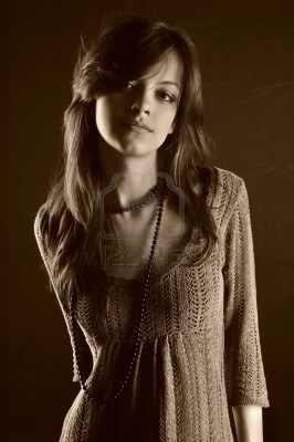 6744556-sexual-brunette-fashion-model-in-knitted-dress-sepia (266x400, 24Kb)