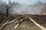 Смог от лесных и торфяных пожаров добрался до центра Москвы, Россия, 26 июля 2010 года.