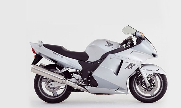 Model CBR 1100 XX produced since 1996 and is still in production. Black streetfighter reach speeds more than two hundred kilometers per hour.