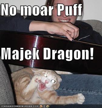 funny-pictures-cat-guitar-puff-dragon (336x357, 25Kb)