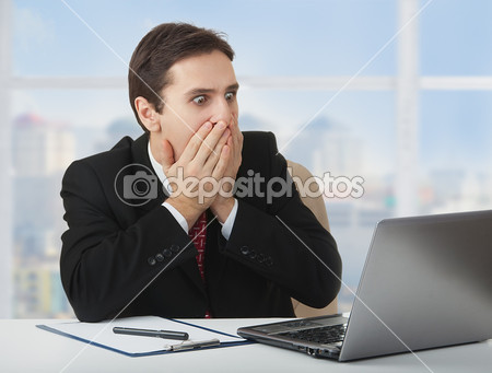 depositphotos_9274739-Surprised--frightened-businessman---looking-at-a-laptop-his-han (450x341, 33Kb)