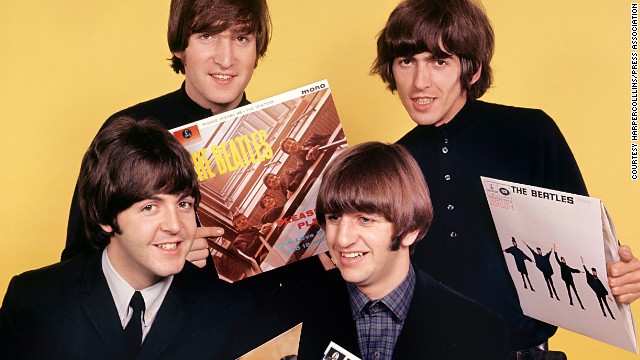 131111111233-beatles-holding-albums-horizontal-gallery (640x360, 74Kb)