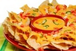 6048410-plate-of-fresh-nachos-with-a-spicy-jalapeno-cheese-sauce_  (320x215, 26Kb)