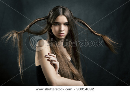 stock-photo-portrait-of-a-beautiful-woman-with-perfect-hair-on-a-dark-background-93014692 (450x320, 45Kb)