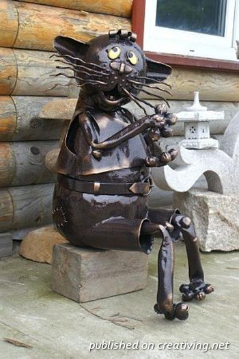 4826692_pamyatnik_kotu_Creativing_net_008 (350x525, 61Kb)