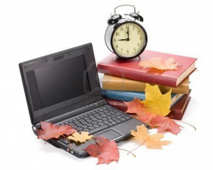 5237241-pile-of-books-notebook-alarm-clock-and-autumn-leaves-on-a-white-background (700x560, 149Kb)