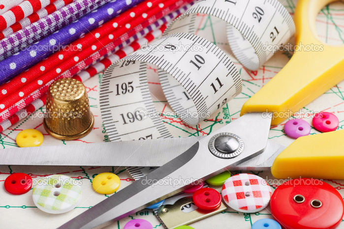 depositphotos_19831539-Sewing-items-buttons-colorful-fabrics-scissors-measuring-tap (700x466, 449Kb)