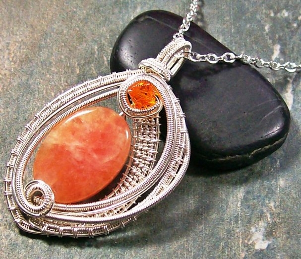 woven_oval_orange_calcite_and_silver_pendant_by_heatherjordanjewelry-d5gppvs (607x522, 249Kb)