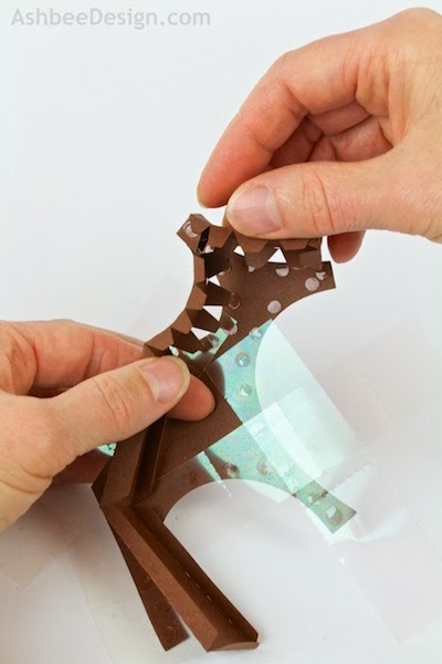 Северные олени и сани с новогодними подарками из бумаги. Шаблоны (14) (400x600, 93Kb)