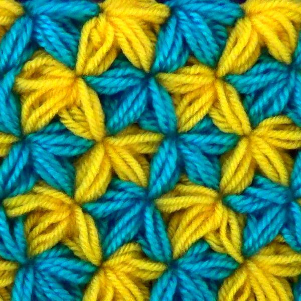 5109897_uzortrilistnikiizpyshnyhstolbikovcrochetpatterntrefoilsofpuffstitchs1 (600x600, 85Kb)