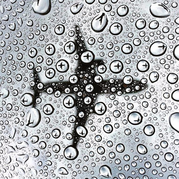 Самолет в каплях дождя (699x700, 676Kb)
