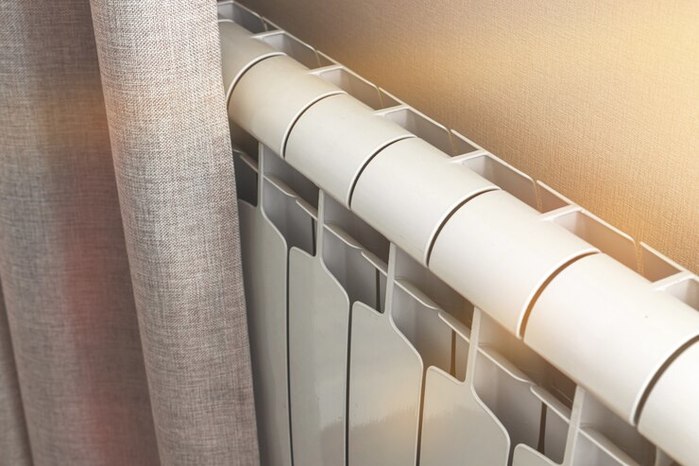 5922005_radiatorbatteryintheroomhomeinteriordesignheatingbackgroundphoto_526934529 (700x466, 59Kb)