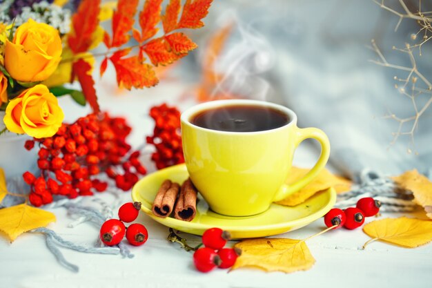 cup-of-coffee-autumn-leaves-and-flowers-on-a-wooden-table_99293-478 (626x417, 51Kb)
