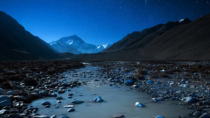 Pebbles in river in valley under stars at night, Everest, Tibet, China (700x393, 314Kb)