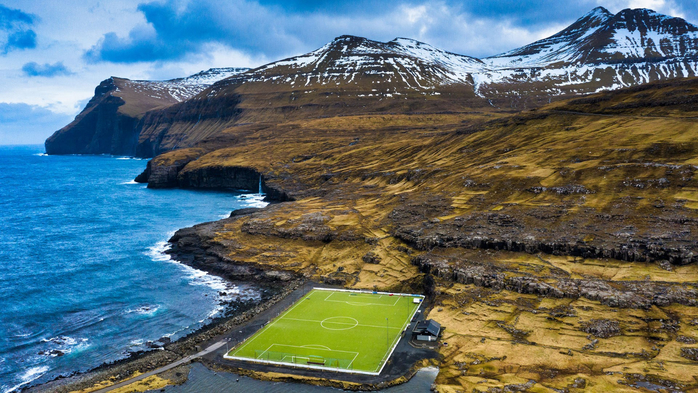 Soccer field between ocean and mountains, Eidi, Eysturoy, Faroe Islands, Denmark (700x393, 442Kb)