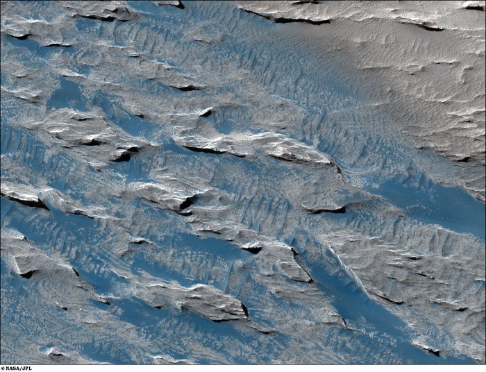 Low Albedo Feature in Aeolis and Zephyria Regions